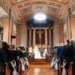 Religious traditional Catholic ceremony at Basilica of St. Louis King of France