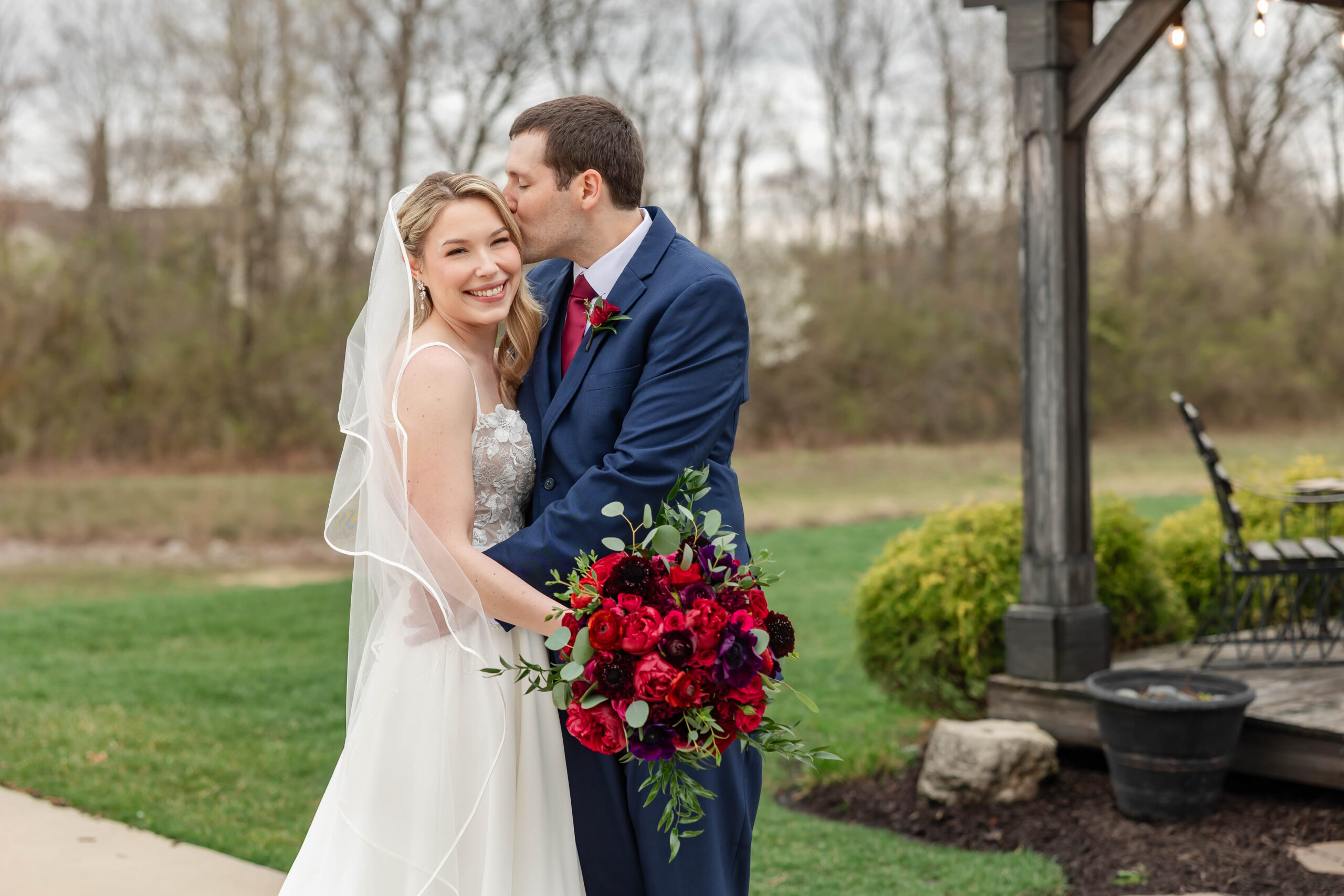 Outdoor portraits of bride and groom at Piazza Messina Cottleville MO wedding