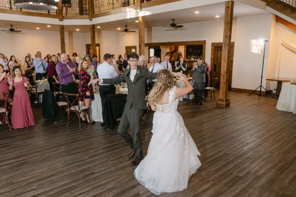 Romantic candid moments of bride and groom at Silver Oaks Chateau in Pacific MO